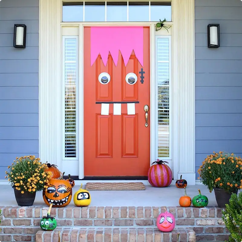 A Silly Monster Door with Painted Pumpkins