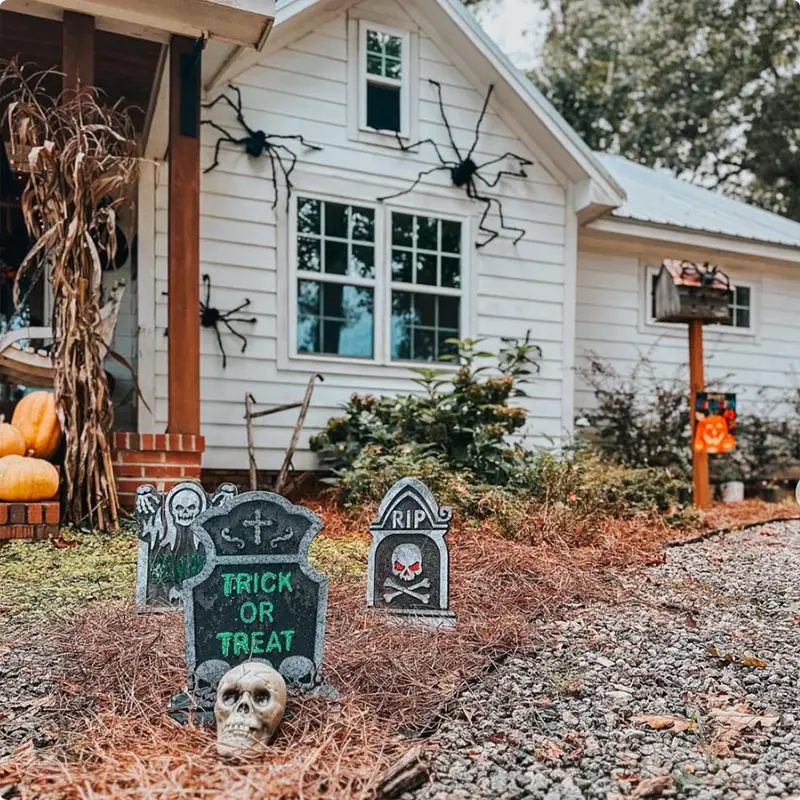 Creep Up the Curb Appeal With Tombstones and Giant Spiders