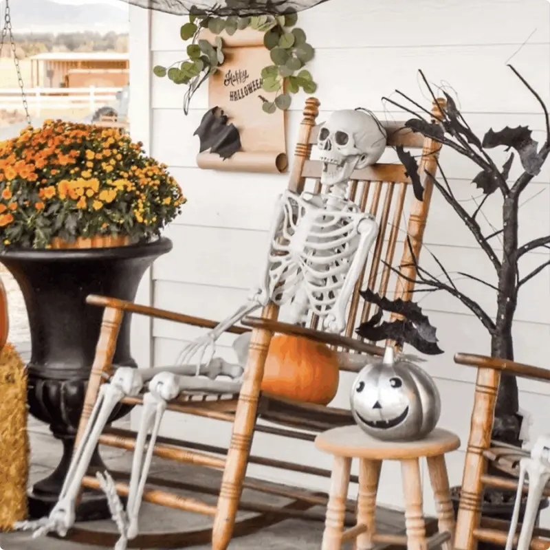 Welcome Guests with a Charming Halloween Porch with Skeletons and Rocking Chairs