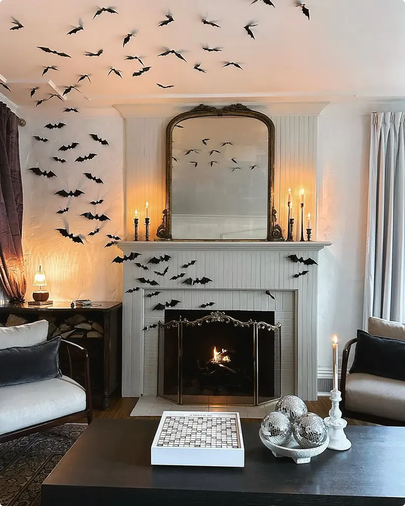 Flying Bats and Elegant Candlelight for a Bewitching Mantel
