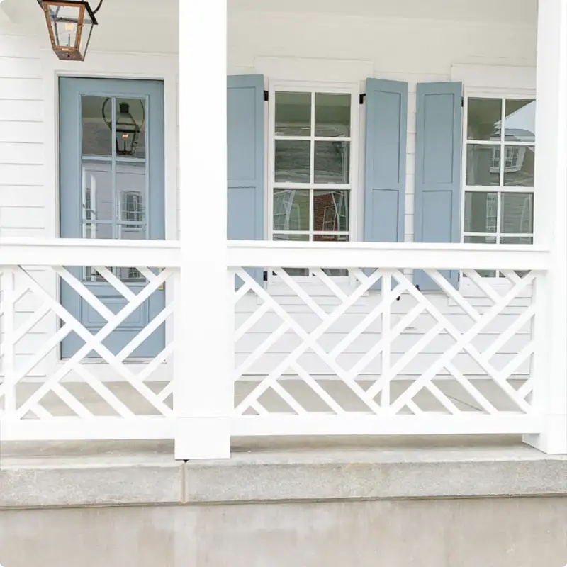 Fresh and Bright — White Deck Rails and a Blue Front Door