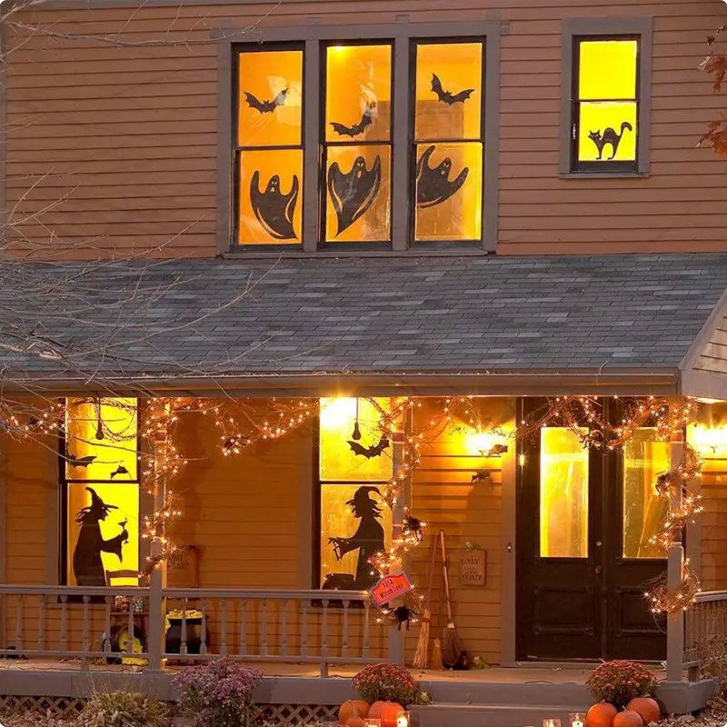 Maximalist Halloween Window Decoration With Ghosts, Bats, Cats, and Witch Decals