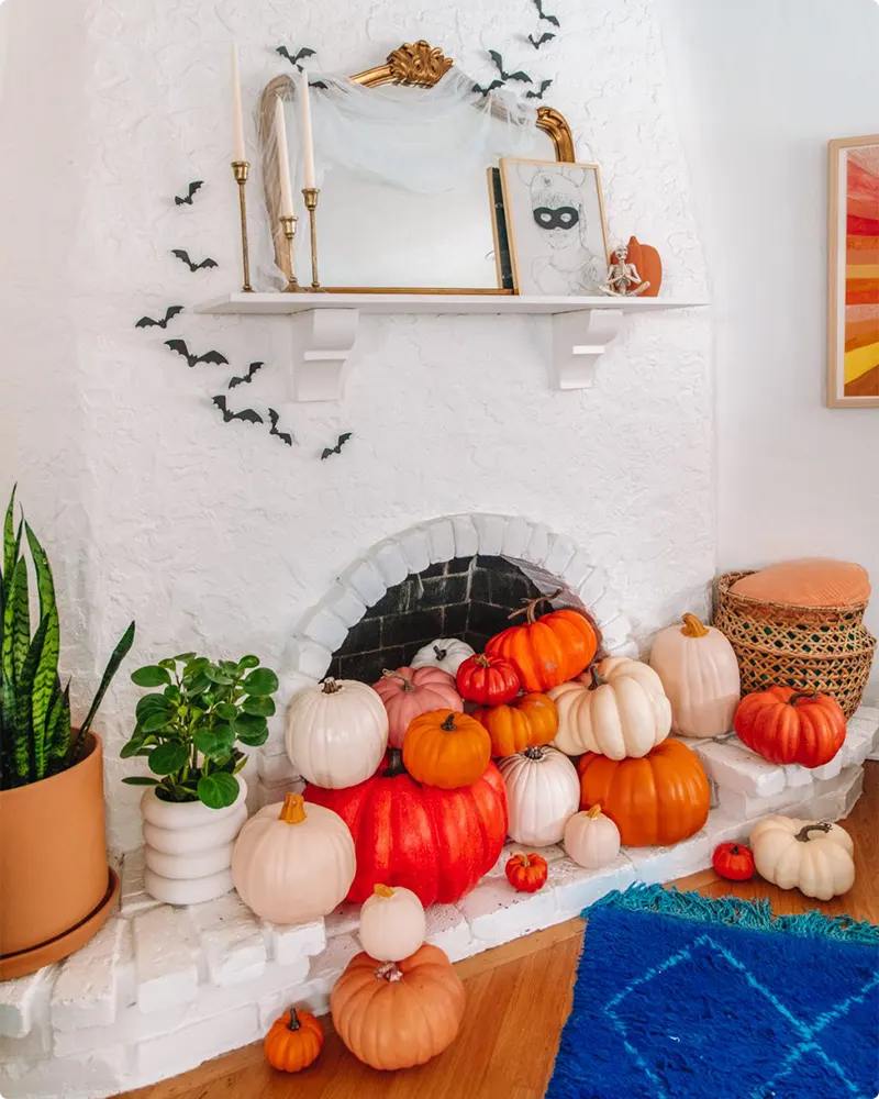 Pumpkin-Filled Fireplace Display for Halloween