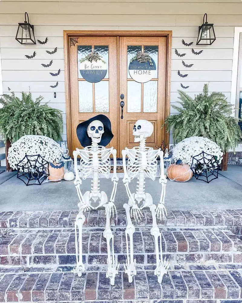 Halloween Porch Featuring Skeleton Couple
