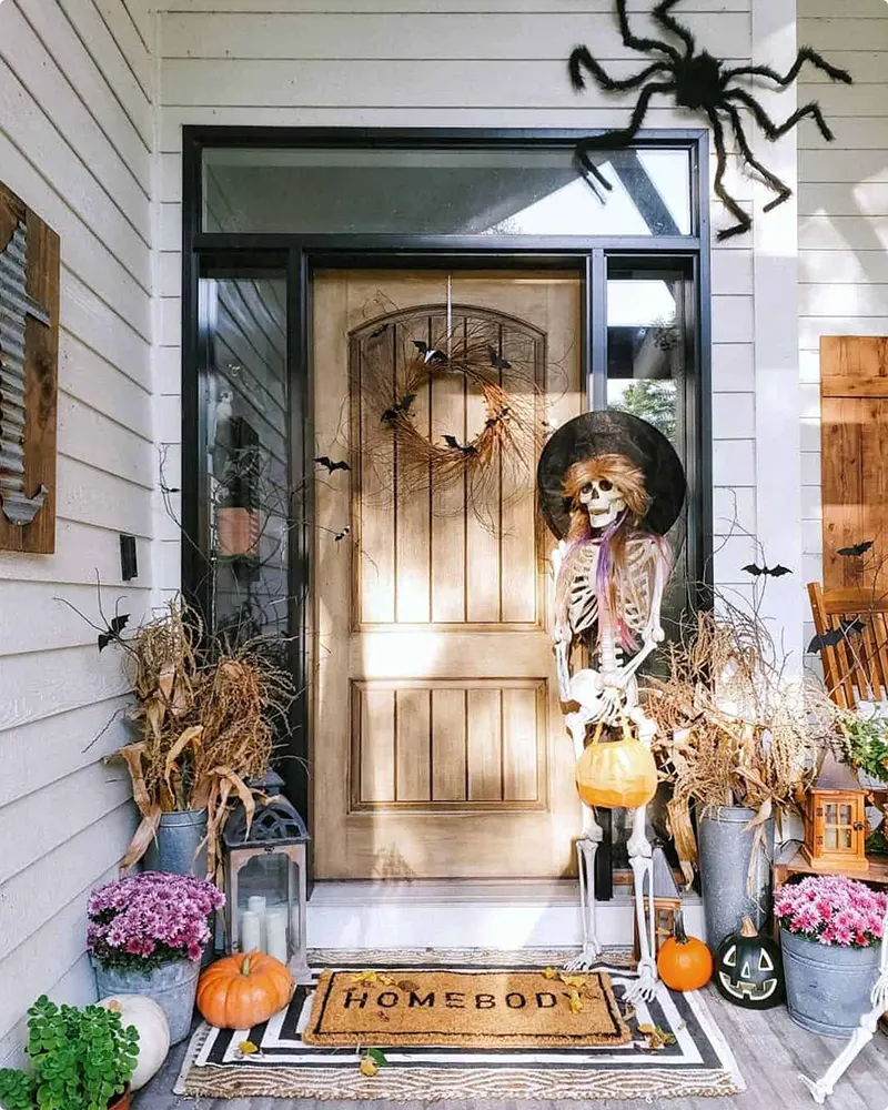 Halloween Porch with Witches, Spiders, and Pumpkins