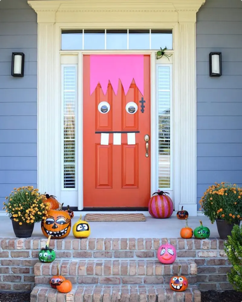 Quirky Monster Door with Painted Pumpkin Characters